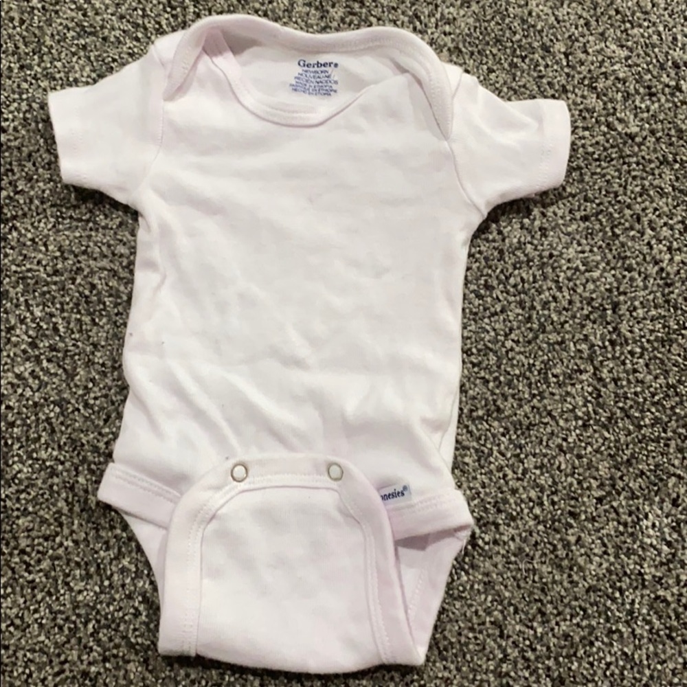This is a brand new newborn Gerber onesie